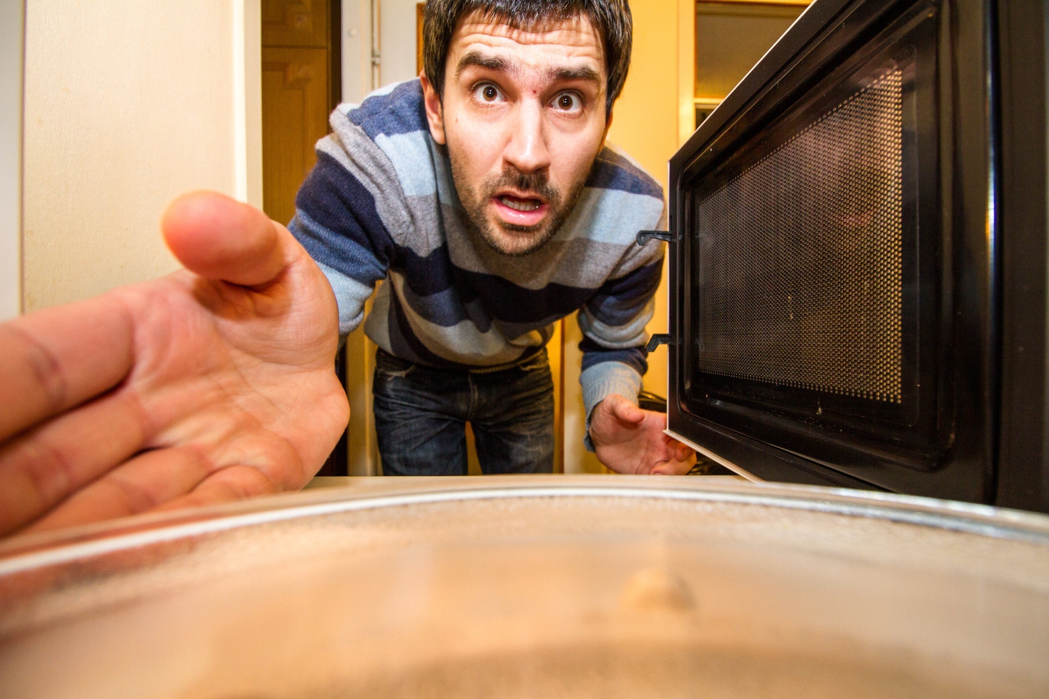 Looking into the microwave during cooking